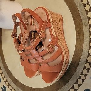 Women size 6 Tan wedge heel Sandal.